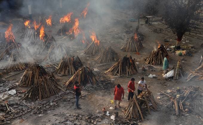 May 1, 2021, New Delhi, New Delhi, India: Covid 19 victims being cremated at Gazipur crematorium on May 1, 2021 in New Delhi, India..As many as 4,01,993 more people tested positive for Covid-19 in the last 24 hours, taking the cumulative caseload to 1,91,64,969, said the Union health ministry on Saturday. This is the highest number of new infections ever recorded in a day across the globe. New Delhi India - ZUMAp176 20210501_zip_p176_023 Copyright: xVijayxPandeyx