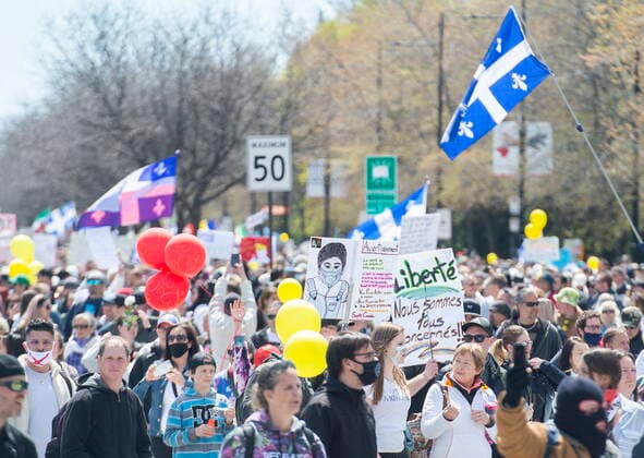 May 1, 2021, Montreal, PQ, Canada: People take part in a demonstration opposing the Quebec governmentÃ¢â‚¬â ¢s measures to help curb the spread of COVID-19 in Montreal, Saturday, May 1, 2021. Montreal Canada  - ZUMAc35_ 20210501_zaf_c35_037 Copyright: xGrahamxHughesx