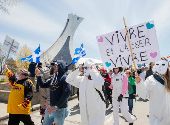 May 1, 2021, Montreal, PQ, Canada: People take part in a demonstration opposing the Quebec governmentÃ¢â‚¬â ¢s measures to help curb the spread of COVID-19 in Montreal, Saturday, May 1, 2021. Montreal Canada  - ZUMAc35_ 20210501_zaf_c35_040 Copyright: xGrahamxHughesx