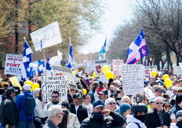 May 1, 2021, Montreal, PQ, Canada: People take part in a demonstration opposing the Quebec governmentÃ¢â‚¬â ¢s measures to help curb the spread of COVID-19 in Montreal, Saturday, May 1, 2021. Montreal Canada  - ZUMAc35_ 20210501_zaf_c35_041 Copyright: xGrahamxHughesx