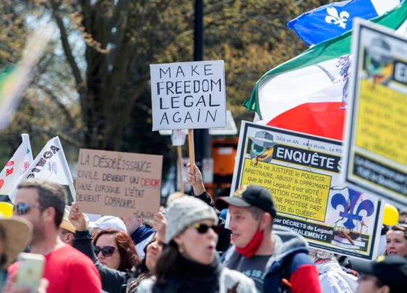 May 1, 2021, Montreal, PQ, Canada: People take part in a demonstration opposing the Quebec governmentÃ¢â‚¬â ¢s measures to help curb the spread of COVID-19 in Montreal, Saturday, May 1, 2021. Montreal Canada  - ZUMAc35_ 20210501_zaf_c35_051 Copyright: xGrahamxHughesx