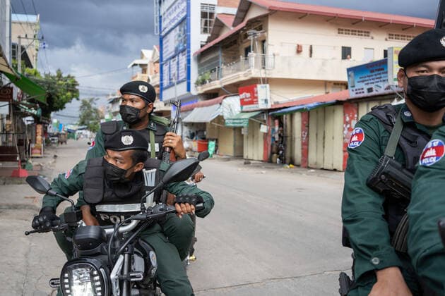 April 23, 2021, Phnom Penh, Cambodia: Military Police patrol in a Red Zone to ensure people abide by the lockdown measures..Phnom Penh remains in lockdown as Cambodia takes drastic measures to reduce the spread of its worst COVID-19 outbreak to date. The lockdown has forced many out of work, including factory workers and market vendors, leaving the cities™ poorest residents struggling or unable to afford basic necessities. Phnom Penh Cambodia - ZUMAs197 20210423_zaa_s197_464 Copyright: xAndyxBallx