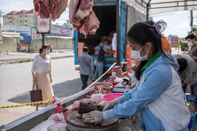 April 24, 2021, Phnom Penh, Cambodia: Cambodia s Ministry of Commerce send trucks of food to Red Zones during the coronavirus pandemic..Phnom Penh remains in lockdown as Cambodia takes drastic measures to reduce the spread of its worst COVID-19 outbreak to date. The lockdown has forced many out of work, including factory workers and market vendors, leaving the cities™ poorest residents struggling or unable to afford basic necessities. Phnom Penh Cambodia - ZUMAs197 20210424_zaa_s197_512 Copyright: xAndyxBallx