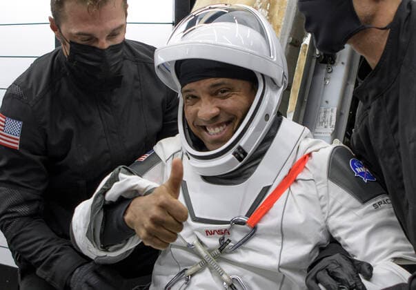 May 2, 2021, Panama City, Florida, USA: NASA astronaut Victor Glover is helped out of the SpaceX Crew Dragon Resilience spacecraft onboard the SpaceX GO Navigator recovery ship after he, NASA astronauts Mike Hopkins, Shannon Walker, and Japan Aerospace Exploration Agency (JAXA) astronaut Soichi Noguchi, landed in the Gulf of Mexico off the coast of Panama City, Florida, Sunday, May 2, 2021. NASA™s SpaceX Crew-1 mission was the first crew rotation flight of the SpaceX Crew Dragon spacecraft and Falcon 9 rocket with astronauts to the International Space Station as part of the agency™s Commercial Crew Program. .Mandatory Credit: NASA via CNP Panama City USA - ZUMAs152 20210502_zaa_s152_005 Copyright: xBillxIngallsx