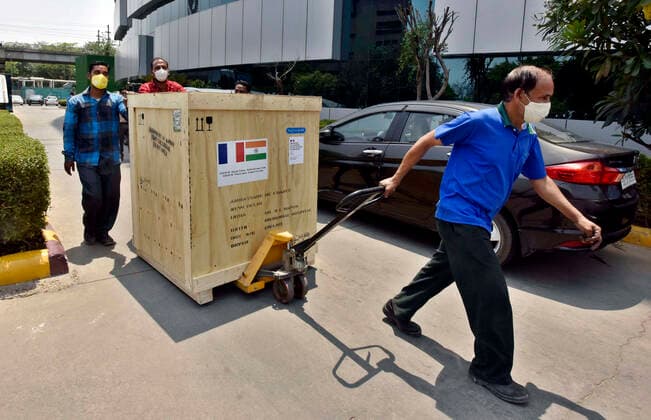NEW DELHI, INDIA - MAY 2: Oxygen generator and a High-Pressure filling system donated by the Govt. of France to BLK-Max Hospital, being unloaded, on May 2, 2021 in New Delhi, India. (Photo by Sanjeev Verma Hindustan Times ) Daily Life Amid Coronavirus Pandemic In India