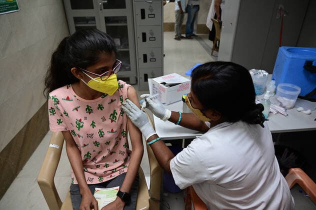 May 3, 2021, Prayagraj, Uttar Pradesh, India: Prayagraj: A medical worker inoculates a youth with a dose of the Covishield coronavirus vaccine, at Moti Lal Nehru Medical College in Allahabad on Monday, May 03, 2021 during the first day of India s vaccination drive to all adults. Prayagraj India - ZUMAv115 20210503_zap_v115_029 Copyright: xPrabhatxKumarxVermax