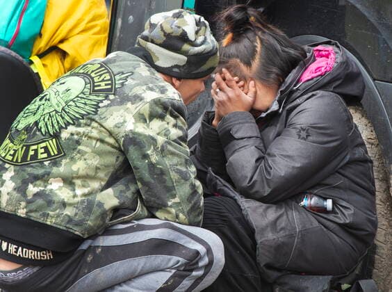 May 3, 2021, Montreal, PQ, Canada: People comfort each other at a homeless camp in the east end of Montreal, Monday, May 3, 2021. Authorities have ordered the camp to be taken down. Montreal Canada  - ZUMAc35_ 20210503_zaf_c35_002 Copyright: xRyanxRemiorzx