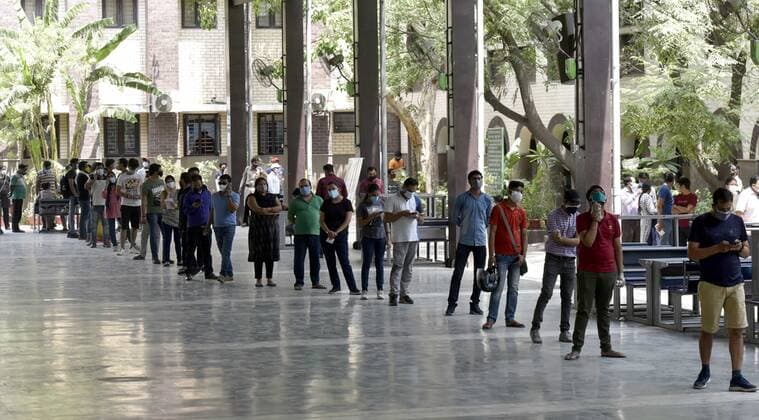 NEW DELHI, INDIA - MAY 3: People in the age group of 18 to 44 waiting in Long queue to get Covid vaccine at a Govt School Sarvodaya Kanya Vidyalaya, West Vinod Nagar, Patpatganj on May 3, 2021 in New Delhi, India. Kicking off the COVID-19 vaccination drive in Delhi, Deputy Chief Minister Manish Sisodia visited Sarvodaya Kanya Vidyalaya, West Vinod Nagar, where 5 sites have been set up for citizens to get COVID-19 vaccines starting today for individuals aged 18-45 years. Deputy Chief Minister Shri Manish Sisodia said, Delhi Government has received 4.5 lakh vaccination doses until now, on the basis of which 301 vaccination centres have been made in 76 schools across Delhi, vaccinating 45,100 citizens. ( Photo by Sonu Mehta Hindustan