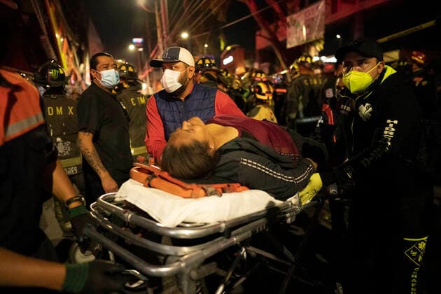 (210504) -- MEXICO CITY, May 4, 2021 -- Rescuers transfer an injured at the scene of a metro bridge collapse in Mexico City, Mexico, May 3, 2021. At least 15 people were killed and 70 others injured after a metro bridge collapsed in southern Mexico City Monday night, according to an updated preliminary report from local authorities. David de la Paz) (SPOT NEWS)MEXICO-MEXICO CITY-METRO BRIDGE COLLAPSE DxAviddelapaz 