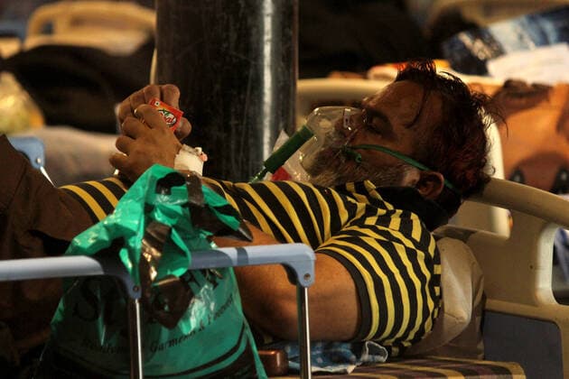 Corona Virus Outbreak In India Patients rest inside a banquet hall, temporarily converted into a makeshift quarantine facility for patients diagnosed with the coronavirus disease (COVID-19), in New Delhi, India on May 4, 2021. India recorded over 3.57 lakh new covid-19 cases in the 24 hours, taking the total infections past the 2 crore mark. With 3,449 deaths, the toll is now over 2.22 lakh. New Delhi India makhija-notitle210504_npy9a  Copyright: xMayankxMakhijax
