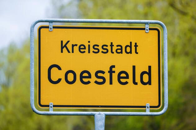 Coesfeld, North Rhine-Westphalia, Germany Place name sign in times of Corona pandemic, Coesfeld district starts as model region in NRW with relaxations Coesfeld North Rhine-Westphalia Germany