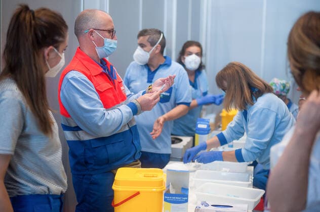 May 5, 2021, Malaga, Spain: Nurses and health workers are seen preparing syringes with doses of Pfizer during a massive vaccination at Fair and Congresses Palace..Health regional authorities have retimed again the vaccination with doses of Pfizer BioNTech inside large and secure places following all protective measures, as part of massive vaccination One million plan after the announcement of Andalusian government to inoculate around 600.000 vaccines during the week. Malaga Spain - ZUMAs197 20210505_zaa_s197_008 Copyright: xJesusxMeridax