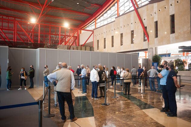 May 5, 2021, Malaga, Spain: People wearing face masks as a precaution against the spread of covid-19 are seen waiting in queue during a massive vaccination at Fair and Congresses Palace..Health regional authorities have retimed again the vaccination with doses of Pfizer BioNTech inside large and secure places following all protective measures, as part of massive vaccination One million plan after the announcement of Andalusian government to inoculate around 600.000 vaccines during the week. Malaga Spain - ZUMAs197 20210505_zaa_s197_026 Copyright: xJesusxMeridax