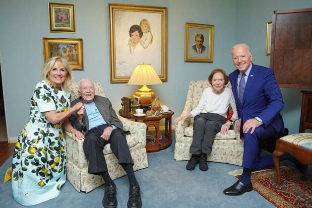 President Joe Biden and first lady Jill Biden are pictured during an April 29, 2021, visit with former President Jimmy Carter and former first lady Rosalynn Carter at their home in Plains, Georgia. White House  WAX2021050501 ADAMxSCHULTZ