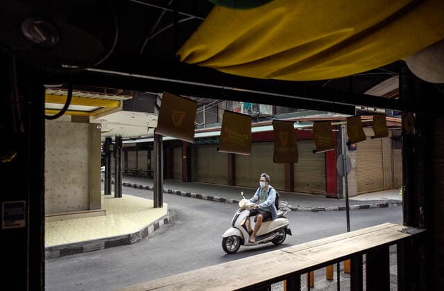 May 5, 2021, Bangkok, Thailand: View of an empty intersection of closed Go go bars at the internationally famous red light district , Patpong..Bangkok night life entertainment venues, bars, pubs and restaurants are closed in the designated red zone. A partial lockdown has been imposed for 2 weeks during May 3 -17, 2021, due to a recent upsurge of the Covid C-19 virus outbreak in the capital. Bangkok Thailand - ZUMAs197 20210505_zaa_s197_177 Copyright: xPaulxLakatosx
