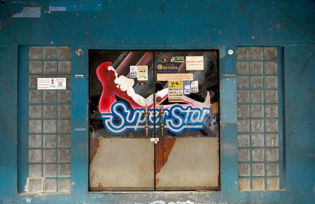 May 5, 2021, Bangkok, Thailand: View of a closed Go go bar, SuperStar, at the internationally famous red light district, Patpong..Bangkok night life entertainment venues, bars, pubs and restaurants are closed in the designated red zone. A partial lockdown has been imposed for 2 weeks during May 3 -17, 2021, due to a recent upsurge of the Covid C-19 virus outbreak in the capital. Bangkok Thailand - ZUMAs197 20210505_zaa_s197_179 Copyright: xPaulxLakatosx