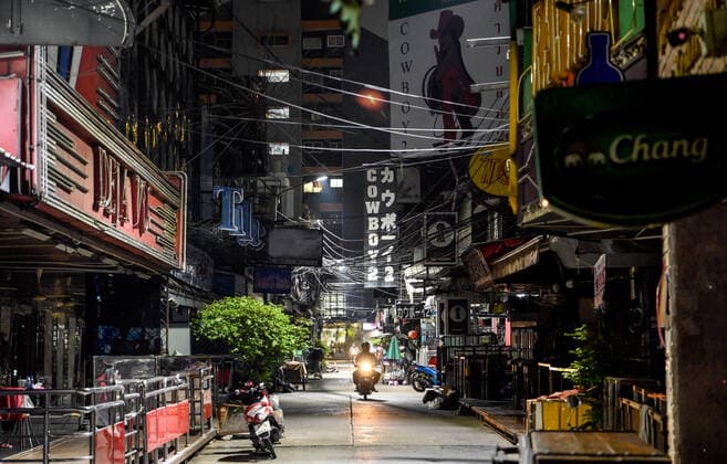May 5, 2021, Bangkok, Thailand: View of an empty internationally famous Soi Cowboy go go bar entertainment area..Bangkok night life entertainment venues, bars, pubs and restaurants are closed in the designated red zone. A partial lockdown has been imposed for 2 weeks during May 3 -17, 2021, due to a recent upsurge of the Covid C-19 virus outbreak in the capital. Bangkok Thailand - ZUMAs197 20210505_zaa_s197_193 Copyright: xPaulxLakatosx