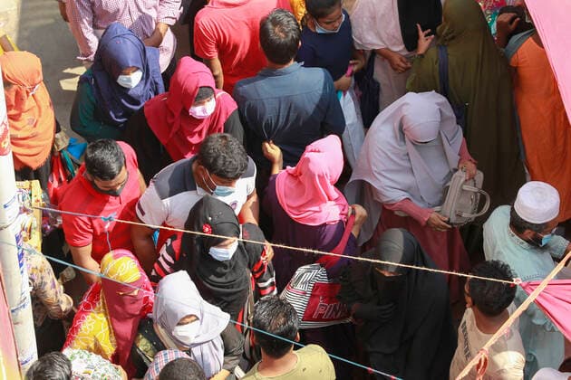 May 6, 2021, Dhaka, Bangladesh: Bangladeshi people throng a market without caring for physical distancing crucial for checking coronavirus (COVID-19) spread, in Dhaka, Bangladesh, May 6, 2021. The Bangladesh government allowed all stores and shopping malls to reopen altering the lockdown rules ahead of the Eid al-Fitr festival. Dhaka Bangladesh - ZUMAd117 20210506_zap_d117_016 Copyright: xSuvraxKantixDasx