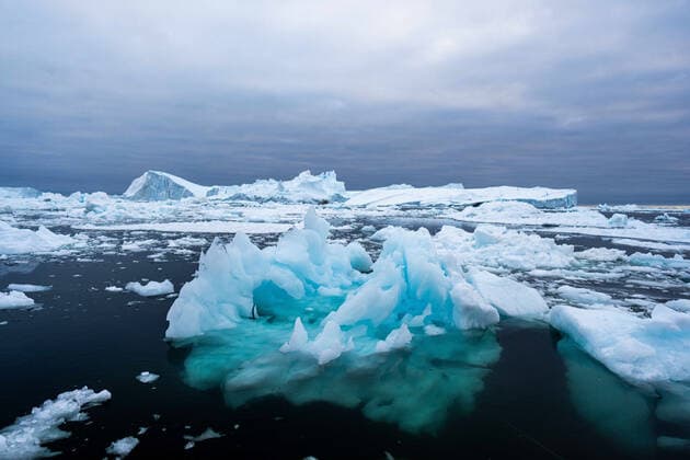 Icebergs In Greenland Icebergs near Ilulissat, Greenland. Climate change is having a profound effect in Greenland with glaciers and the Greenland ice cap retreating. Ilulissat Greenland pedersen-icebergs210507_np8pY  Copyright: xUlrikxPedersenx
