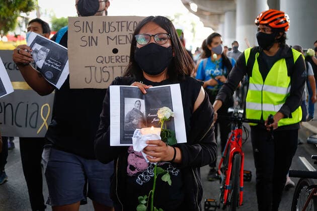 May 7, 2021, Mexico City, Mexico: A protester holds a placard with a picture of a victim who was killed during a protest march in Tlahuac Mayoralty..Protesters take to the streets of Mexico city demanding justice for those involved in the subway overpass incident that collapsed and has killed 25 people so far. Mexico City Mexico - ZUMAs197 20210507_zaa_s197_167 Copyright: xGuillermoxDiazx