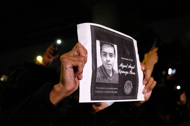 May 7, 2021, Mexico City, Mexico: A protester holds a placard with a picture of a victim who was killed, during a protest march in Tlahuac Mayoralty..Protesters take to the streets of Mexico city demanding justice for those involved in the subway overpass incident that collapsed and has killed 25 people so far. Mexico City Mexico - ZUMAs197 20210507_zaa_s197_173 Copyright: xGuillermoxDiazx