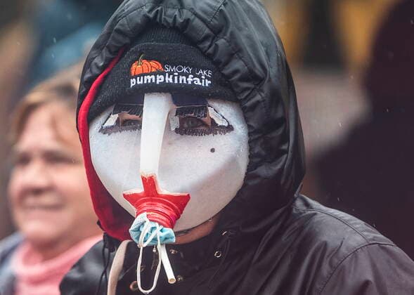 May 8, 2021, Mirror, ab, Canada: A supporter wears a milk jug mask during a rally against measures taken by government and health authorities to curb the spread of COVID-19 at the Whistle Stop cafe in Mirror Alta, on Saturday May 8, 2021. The Whistle Stop was shut down by AHS for not complying with COVID-19 rules. Mirror Canada  - ZUMAc35_ 20210508_zaf_c35_070 Copyright: xJasonxFransonx