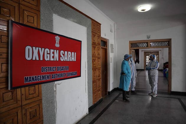Coronavirus Emergency In India Health workers stand outside temporary Covid-19 hospital in Srinagar, Indian Administered Kashmir on 08 May 2021. A Local NGO Athrout has converted Hajj house into a 100-bedded Covid centre as the space in hospitals Srinagar India mattoo-notitle210508_nptMs  Copyright: xMuzamilxMattoox