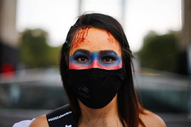 May 8, 2021, Mexico City, Mexico: A Colombian citizen seen with paintings on her face during a protest in support of the National Strike in Colombia..Several demonstrations have been carried out in Mexico City rejecting the militarization exercised by the President of Colombia Ivan Duque Marquez. Mexico City Mexico - ZUMAs197 20210508_zaa_s197_251 Copyright: xGuillermoxDiazx