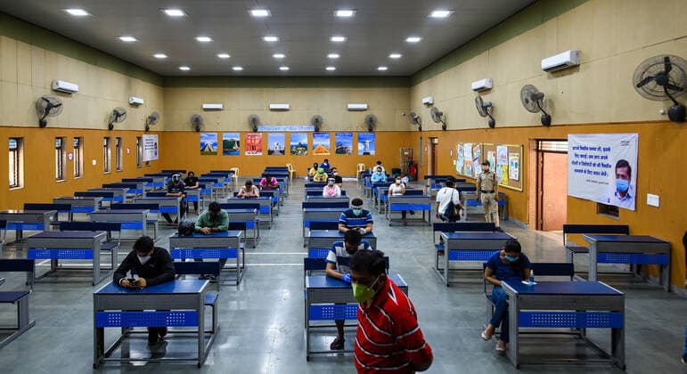 NEW DELHI, INDIA - MAY 8: People in the age group of 18-44 seen in the observation area after being inoculated with a Covid-19 vaccine during the third phase of vaccination, at Sarvodaya Kanya Vidyalaya school, on May 8, 2021 in New Delhi, India. (Photo by Amal KS Hindustan Times) COVID-19 Vaccination Drive