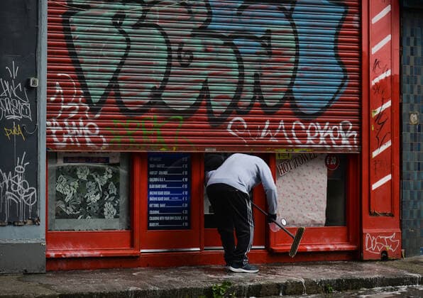 Daily Life In Dublin During COVID-19 Lockdown A man cleans the facade of a local barbershop in Dublin s Portobello area before it reopens, scheduled for tomorrow 10 May. On Sunday, 9 May 2021, in Dublin, Ireland. Dublin Ireland widak-dublinda210509_npYbw  Copyright: xArturxWidakx