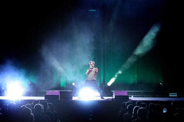May 9, 2021, Lisbon, Portugal: Portuguese comedian Tio Jel performs during a comedy pilot test event at Campo Pequeno in Lisbon, Portugal, on May 9, 2021. The fourth lockdown easing pilot test event in Portugal to assess the feasibility of cultural shows with audiences, took place in Lisbon on Sunday, with a comedy show at Campo Pequeno with a capacity of 1,000 spectators. The use of masks during the entire show was compulsory as well as a prior negative result from an antigen test. Lisbon Portugal - ZUMAf123 20210509_zap_f123_010 Copyright: xPedroxFiuzax