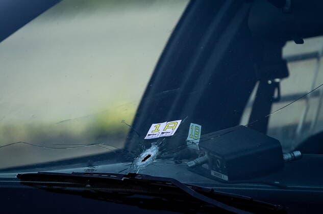 May 9, 2021, Richmond, BC, Canada: A bullet hole is seen in the windshield of an RCMP vehicle approximately 4 km from Vancouver International Airport after a one person was killed during a shooting outside the international departures terminal at the airport, in Richmond, B.C., Sunday, May 9, 2021. Richmond Canada  - ZUMAc35_ 20210509_zaf_c35_087 Copyright: xDarrylxDyckx