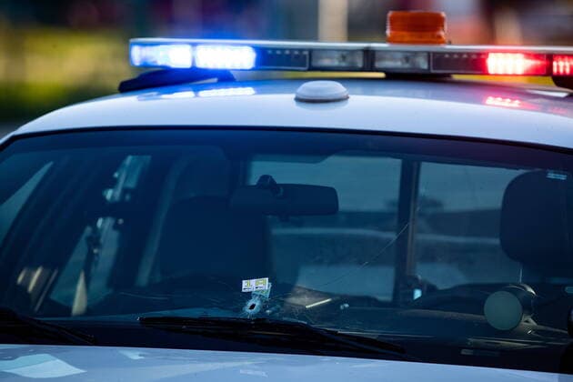May 9, 2021, Richmond, BC, Canada: A bullet hole is seen in the windshield of an RCMP vehicle approximately 4 km from Vancouver International Airport after a one person was killed during a shooting outside the international departures terminal at the airport, in Richmond, B.C., Sunday, May 9, 2021. Richmond Canada  - ZUMAc35_ 20210509_zaf_c35_093 Copyright: xDarrylxDyckx