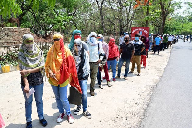 May 10, 2021, Prayagraj, Uttar Pradesh, India: Prayagraj: People over 18 year of age group wait in queue to receive COVID-19 vaccine dose at Moti Lal Nehru Medical college in Prayagraj on Thursday, May 10, 2021. Prayagraj India - ZUMAv115 20210510_zap_v115_013 Copyright: xPrabhatxKumarxVermax