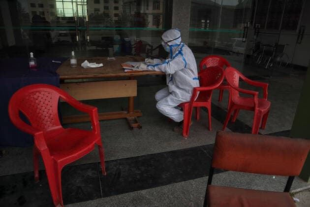 May 8, 2021: A Health worker prepare prescription at a temporary Covid-19 hospital in Srinagar, Indian Administered Kashmir on 08 May 2021. A Local NGO Athrout has converted Hajj house into a 100-bedded Covid centre as the space in hospitals is filling up fast - ZUMAd99_ 20210508_zap_d99_054 Copyright: xMuzamilxMattoox