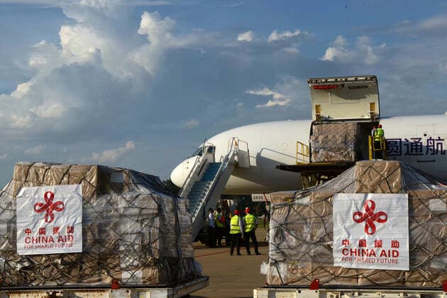 (210511) -- VIENTIANE, May 11, 2021 -- Workers unload anti-epidemic material supplies donated by the Chinese government from a Chinese cargo plane at Wattay International Airport in Vientiane, Laos, May 10, 2021. The Chinese government-donated anti-COVID-19 material supplies have arrived at Wattay International Airport in Lao capital Vientiane with a handover ceremony held upon their arrival. The Chinese government s emergency assistance to Laos includes ventilators, automatic nucleic acid extractors, medical masks, N95 masks, mobile hospital beds, automatic autoclaves, nucleic acid extraction or purification reagents, and nucleic acid detection kits, etc. ) LAOS-VIENTIANE-CHINA-ANTI-EPIDEMIC SUPPLIES-DONATION-ARRIVAL ZhangxJianhua 