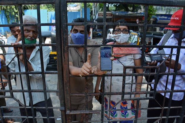 MUMBAI, INDIA - MAY 11: Angry senior citizens vent their ire as PK Road Municipal School was found closed and had to return without vaccination due to vaccine shortage in Mulund, on May 11, 2021 in Mumbai, India. (Photo by Praful Gangurde Hindustan Times ) COVID-19 Vaccination Drive