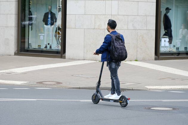 Dusseldorf 12 05 2021 E Scooter Electric Scooter Scooter Electric Scooter Backpack Dusseldorf North Rhine Westphalia Germany