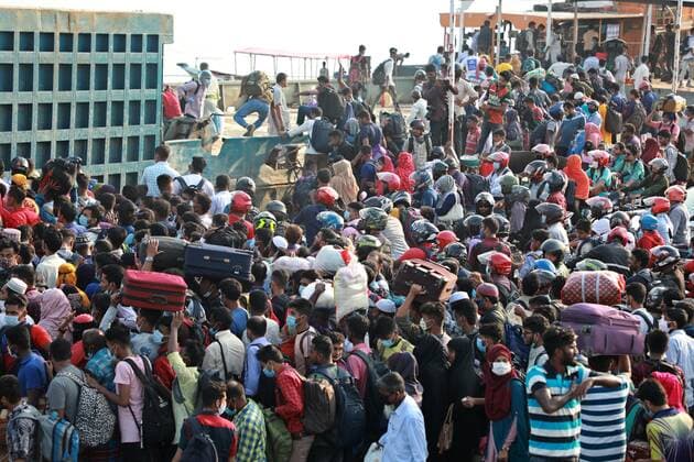 May 12, 2021, Dhaka, Dhaka, Bangladesh: May, 12, 2021 Bangladeshi people take place on an overcrowded ferry to go to their village homes for the Eid al-Fitr festival in Shimuliya, Munshiganj, on the outskirts of Dhaka, Bangladesh, May 12, 2021. Five people died after they fell sick due to the heat on two overcrowded ferries in Madaripur s Banglabazar today. Eight others fell ill at the same time this noon. Dhaka Bangladesh - ZUMAr338 20210512_zip_r338_072 Copyright: xHarun-Or-Rashidx