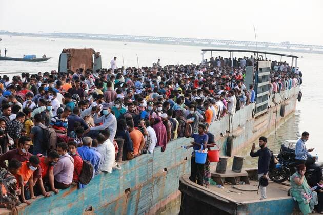 May 12, 2021, Dhaka, Dhaka, Bangladesh: May, 12, 2021 Bangladeshi people take place on an overcrowded ferry to go to their village homes for the Eid al-Fitr festival in Shimuliya, Munshiganj, on the outskirts of Dhaka, Bangladesh, May 12, 2021. Five people died after they fell sick due to the heat on two overcrowded ferries in Madaripur s Banglabazar today. Eight others fell ill at the same time this noon. Dhaka Bangladesh - ZUMAr338 20210512_zip_r338_083 Copyright: xHarun-Or-Rashidx