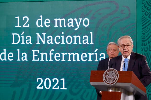 Mexican President Lopez Obrador Daily Morning Press Conference Mexican president Lopez Obrador seen behind while Mexico s Health Minister, Jorge Alcocer Varela speaks during Mexico s president Lopez Obrador press conference as part to celebrate National Nursing Day at National Palace on May 12, 2021 in Mexico City, Mexico. Mexico City Mexico group-mexicanp210512_nppku  Copyright: xEyepixx