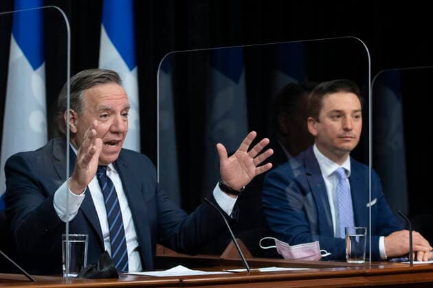 May 13, 2021, QUEBEC, PQ, Canada: Quebec Premier Francois Legault, left, speaks during a news conference after tabling a reform on language law, Thursday, May 13, 2021 at the legislature in Quebec City. Quebec Justice Minister Simon Jolin-Barrette, responsible for language law, right, looks on. QUEBEC Canada - ZUMAc35_ 20210513_zaf_c35_034 Copyright: xJacquesxBoissinotx