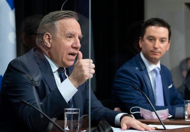 May 13, 2021, QUEBEC, PQ, Canada: Quebec Premier Francois Legault, left, speaks during a news conference after tabling a reform on language law, Thursday, May 13, 2021 at the legislature in Quebec City. Quebec Justice Minister Simon Jolin-Barrette, responsible for language law, right, looks on. QUEBEC Canada - ZUMAc35_ 20210513_zaf_c35_035 Copyright: xJacquesxBoissinotx