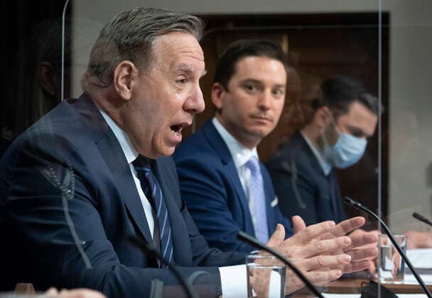 May 13, 2021, QUEBEC, PQ, Canada: Quebec Premier Francois Legault, left, speaks during a news conference after tabling a reform on language law, Thursday, May 13, 2021 at the legislature in Quebec City. Quebec Justice Minister Simon Jolin-Barrette, responsible for language law, right, looks on. QUEBEC Canada - ZUMAc35_ 20210513_zaf_c35_036 Copyright: xJacquesxBoissinotx