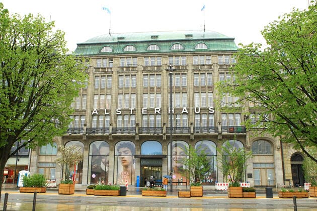 Nearly deserted entrance of the Alsterhaus at the Jungfernstieg in Hamburgs bad weather during the lockdown Altstadt Hamburg