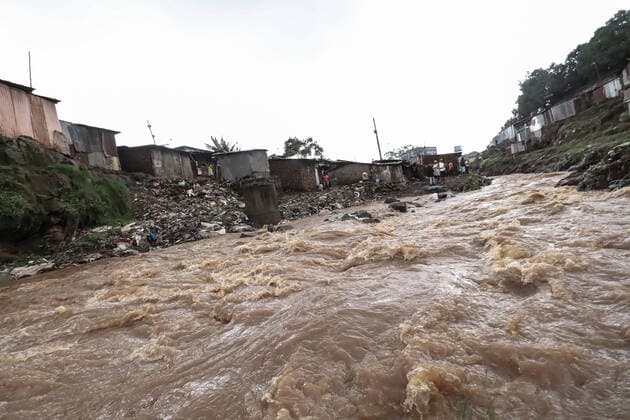 May 14, 2021, Nairobi, Kenya: The flooded river Mutuine on May 14, in Nairobi, Kenya. Residents of Kibera Slums living close by Mutuine River were left homeless after the heavy floods that occured on May 13th, thursday night. Atleast four residents died including two young motorcyclist who were trying to cross over the river late at night whose copes were found nearby the ongoing bridge construction as hundreds of residents were also left homeless. Nairobi Kenya - ZUMAd156 20210514_zip_d156_007 Copyright: xDonwilsonxOdhiambox