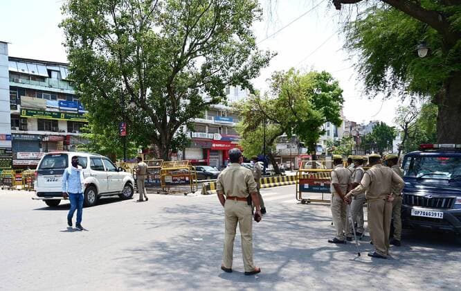 May 15, 2021, Prayagraj, Uttar Pradesh, India: Prayagraj: Police punish people violating lockdown during second wave of Coronavirus pandemic in Prayagraj on Saturday, May 15, 2021. Prayagraj India - ZUMAv115 20210515_zap_v115_023 Copyright: xPrabhatxKumarxVermax