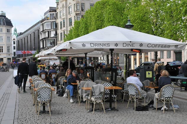 Copenhagen, Denmark. 15 May 2021,Oudoor food and drink seervice in danish cafes and bars and restaurant on hojbro plads and stroget on amager torv in danish capital. (Photo..Francis Joseph Dean Deanpictures)