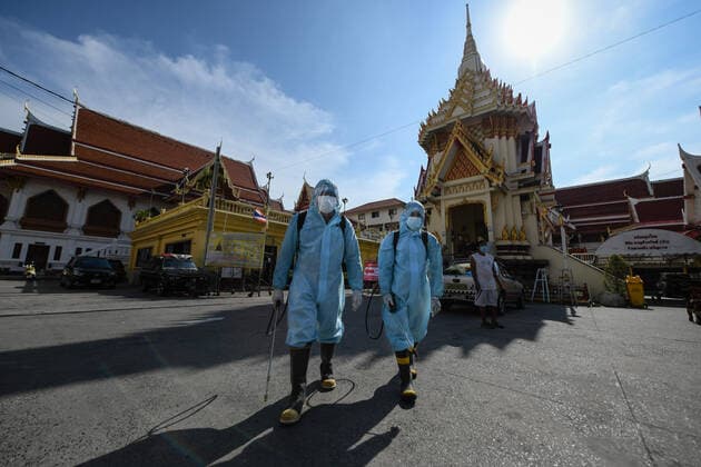 May 16, 2021, Bangkok, Thailand: Rescue workers wearing Personal Protective Equipment (PPE) disinfect the Klong Toey Nok temple in Bangkok..The Public Health Ministry on Sunday reported 24 more Covid-19-related deaths, for a toll of 589 and 2,302 new cases, raising the total to 72,584. Bangkok Thailand - ZUMAs197 20210516_zaa_s197_122 Copyright: xAmpholxThongmueangluangx