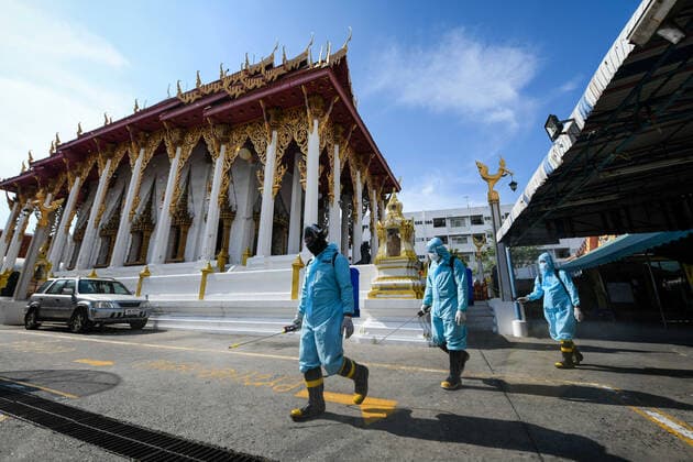 May 16, 2021, Bangkok, Thailand: Rescue workers wearing Personal Protective Equipment (PPE) disinfect the Klong Toey Nok temple in Bangkok..The Public Health Ministry on Sunday reported 24 more Covid-19-related deaths, for a toll of 589 and 2,302 new cases, raising the total to 72,584. Bangkok Thailand - ZUMAs197 20210516_zaa_s197_123 Copyright: xAmpholxThongmueangluangx